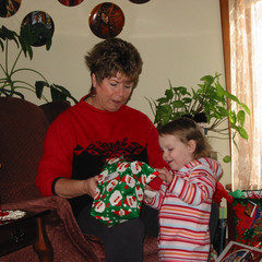 Aubri opening a gift with Nana.jpg