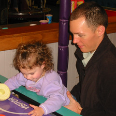 Uncle Dave and Ana Play Skeeball.jpg