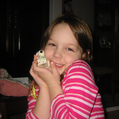 Aubri Hugs an Ornament.JPG