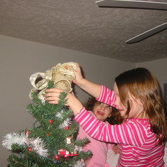 Aubri and Ana Put on the Angel.JPG