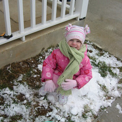 Ana Sits on the Snow Chair.JPG