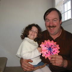 Ana and Grandpa Make a Snowflake.JPG