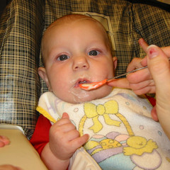Lil A's First Bite of Cereal.JPG