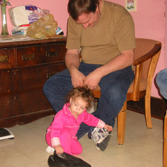 Changing Grandpas Shoes.JPG