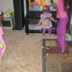Aeryn Studies the Confetti.JPG