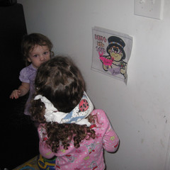 Ana Pins the Diaper on Baby New Year.JPG
