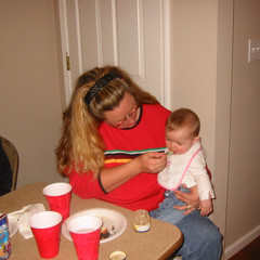 Martha Feeds Caralynn.JPG