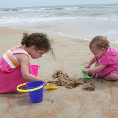 Ana and Aeryn Build Sandcastles.JPG