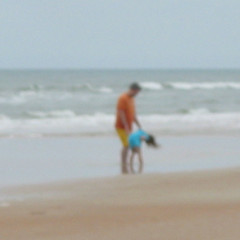Aubri and Dad by the Water.JPG