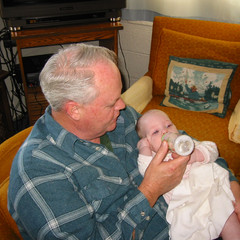 Papa feeding Aubri.jpg